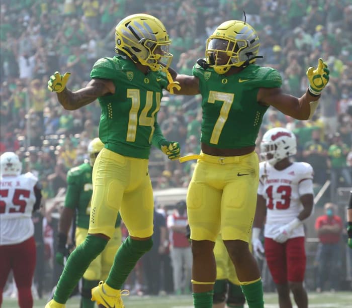 Chris Hutson and CJ Verdell Oregon